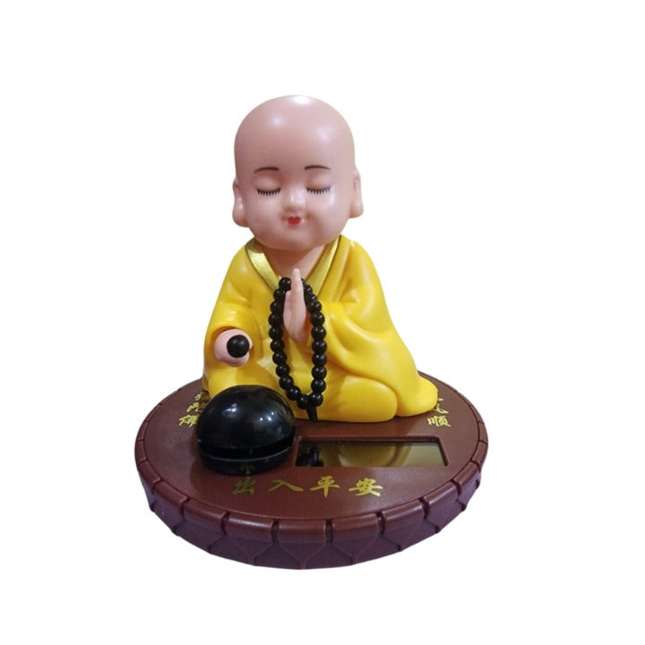 Moving Head Meditating Buddha Monk Statue - Yellow Colour